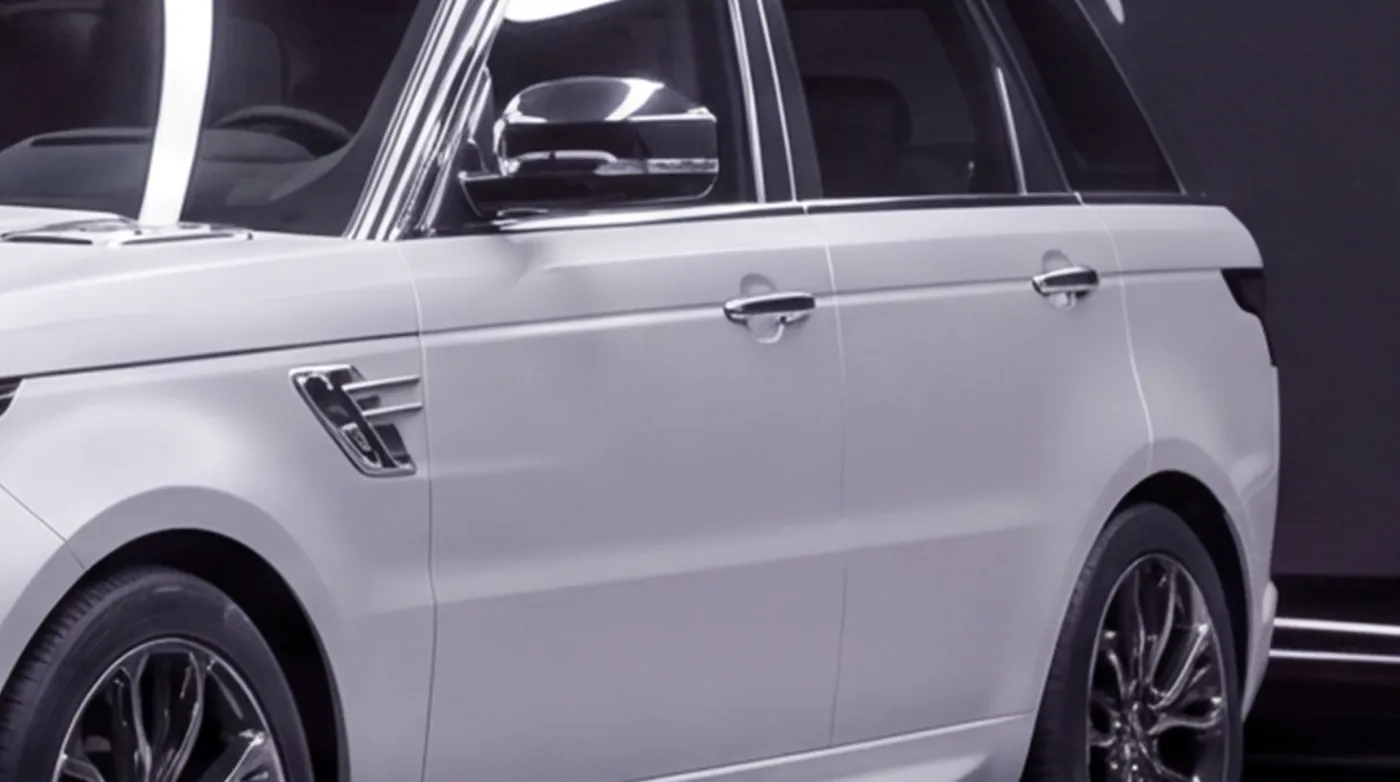 Close-up of the Range Rover Sport's vents, mirrors and handles in factory chrome