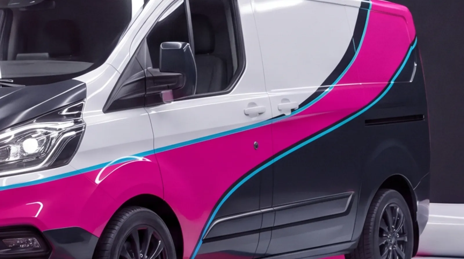 Close-up of the van's side panels in its printed livery