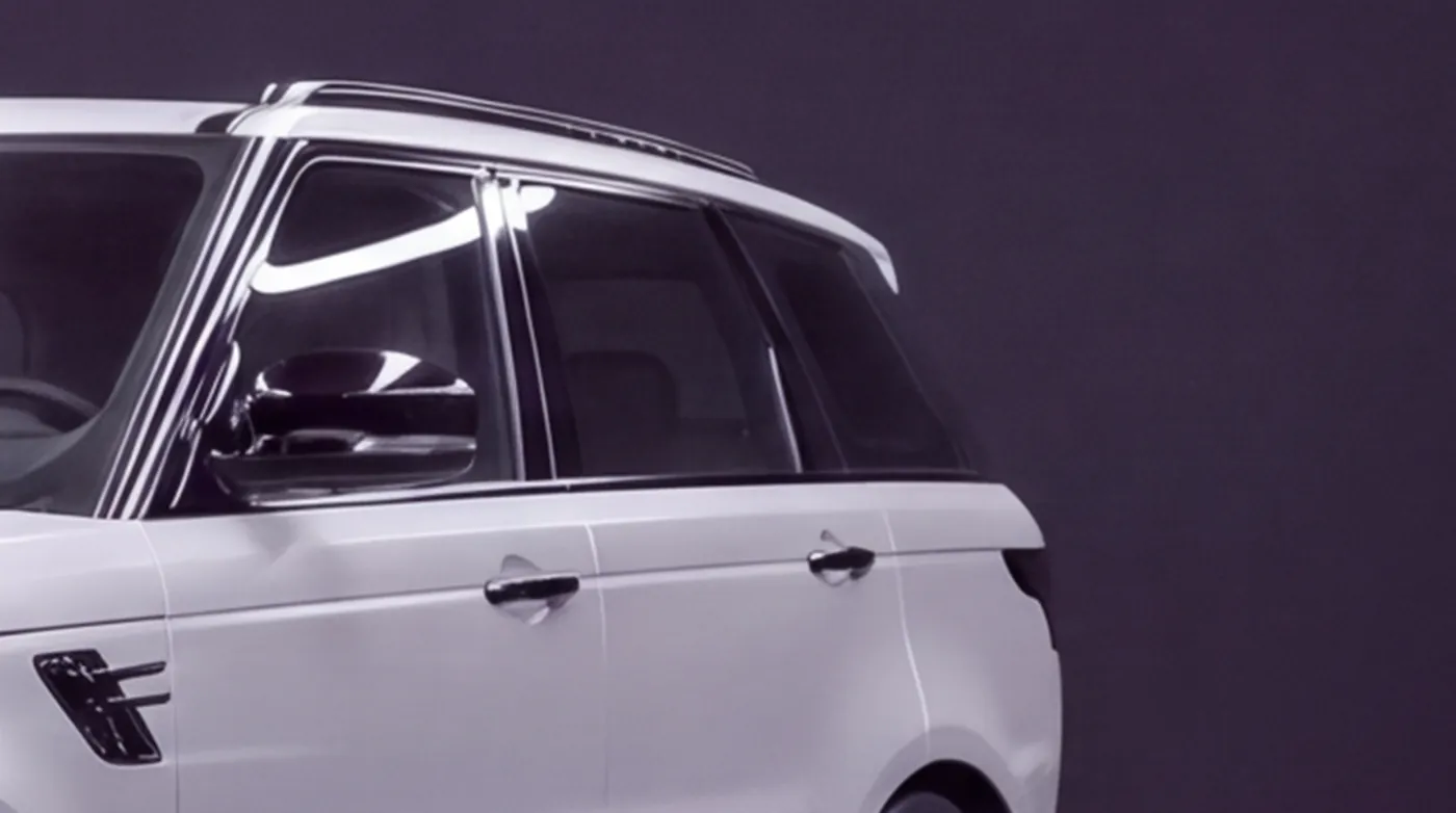 Close-up of the Range Rover Sport's window surrounds wrapped in gloss black