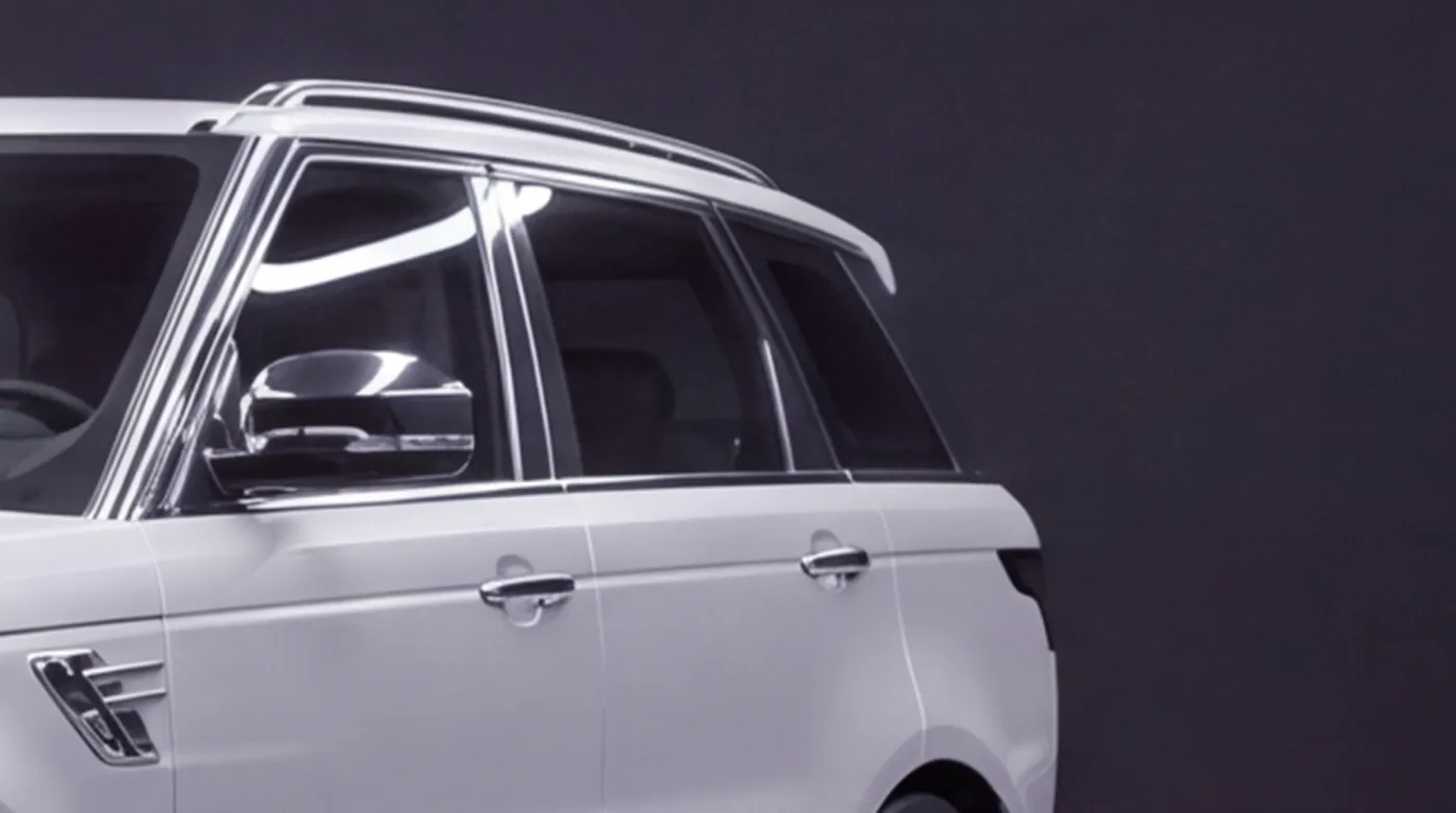 Close-up of the Range Rover Sport's window surrounds in factory chrome